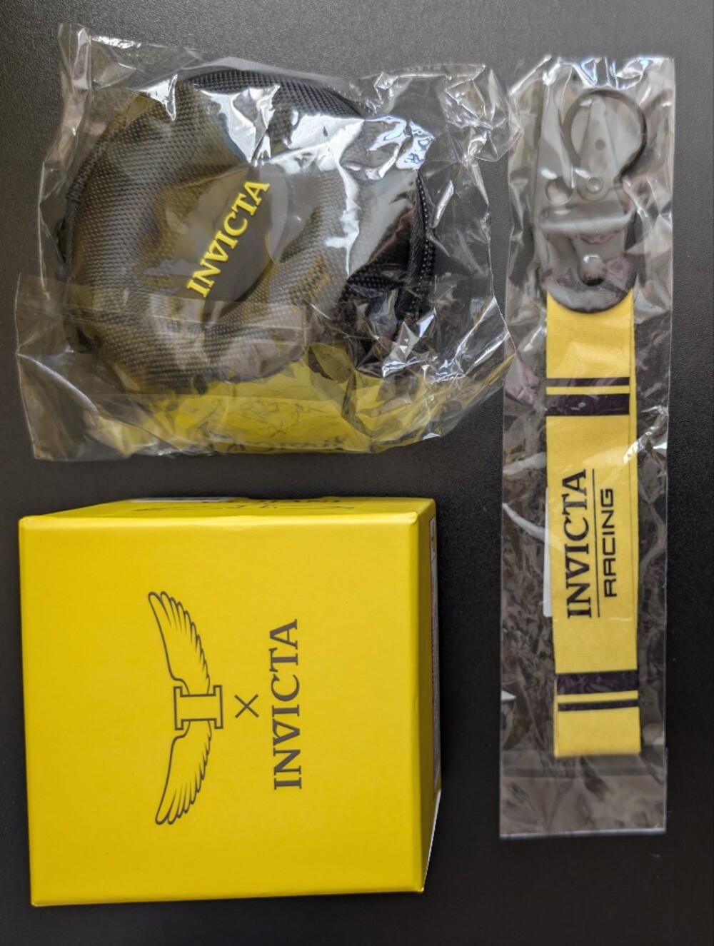 Invicta Turquoise Specialty Watch
Plus Travel Case & Racing Keychain!